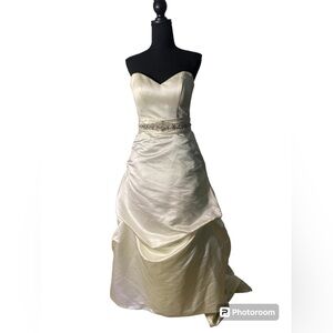 Wedding Dress by Casablanca Ivory with beautiful rhinestone details Long train